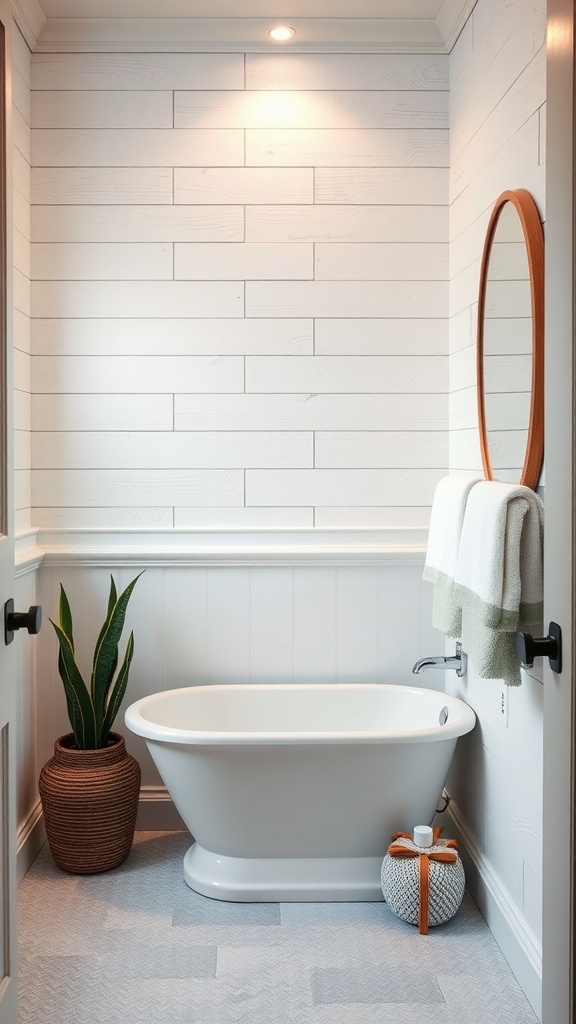 A cozy bathroom featuring textured wood paneling, a white freestanding bathtub, and a potted plant.